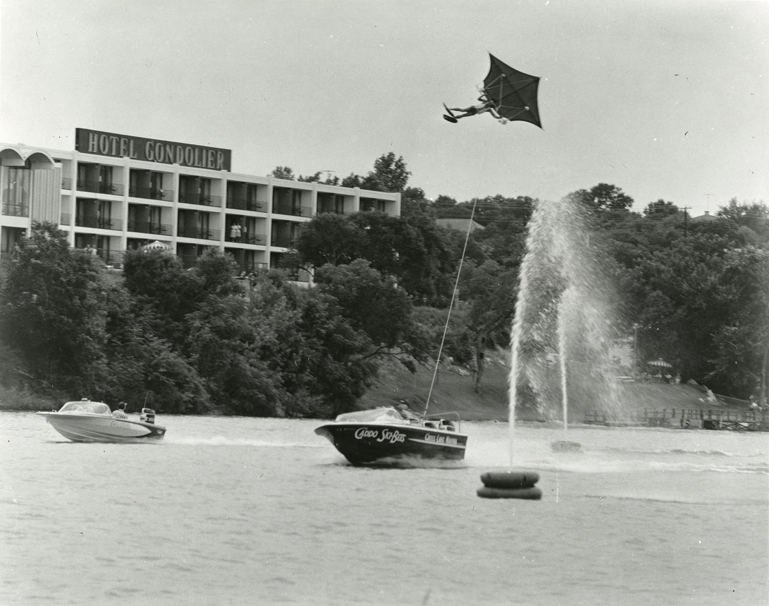 A water skier flying a kite above Town Lake during the 1970 Aqua Festival championship